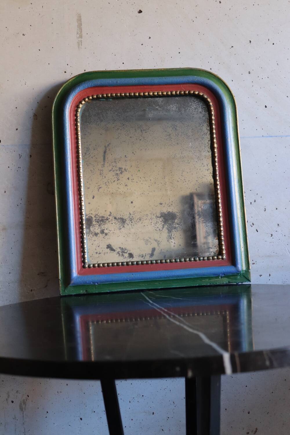 Small Louis Philippe colored patinated mirror