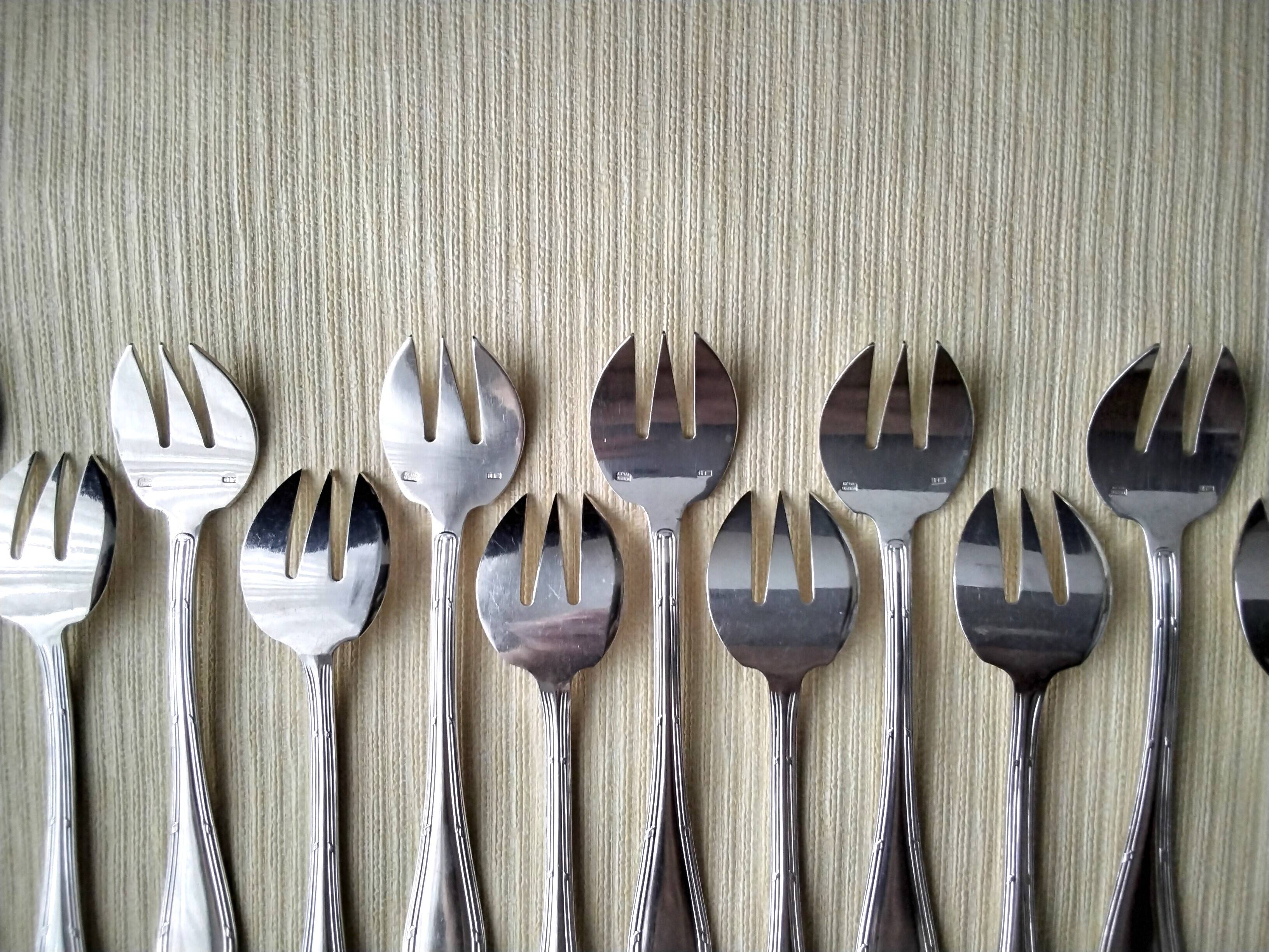 Set of 12 silver-plated oyster forks "Crossed Ribbons"