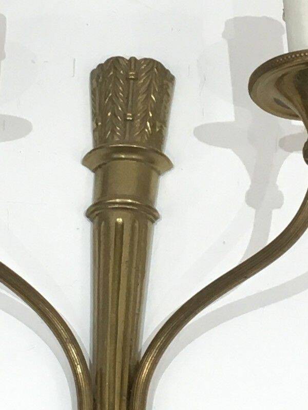 Pair of Louis XVI style bronze wall sconces with quivers
