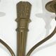 Pair of Louis XVI style bronze wall sconces with quivers