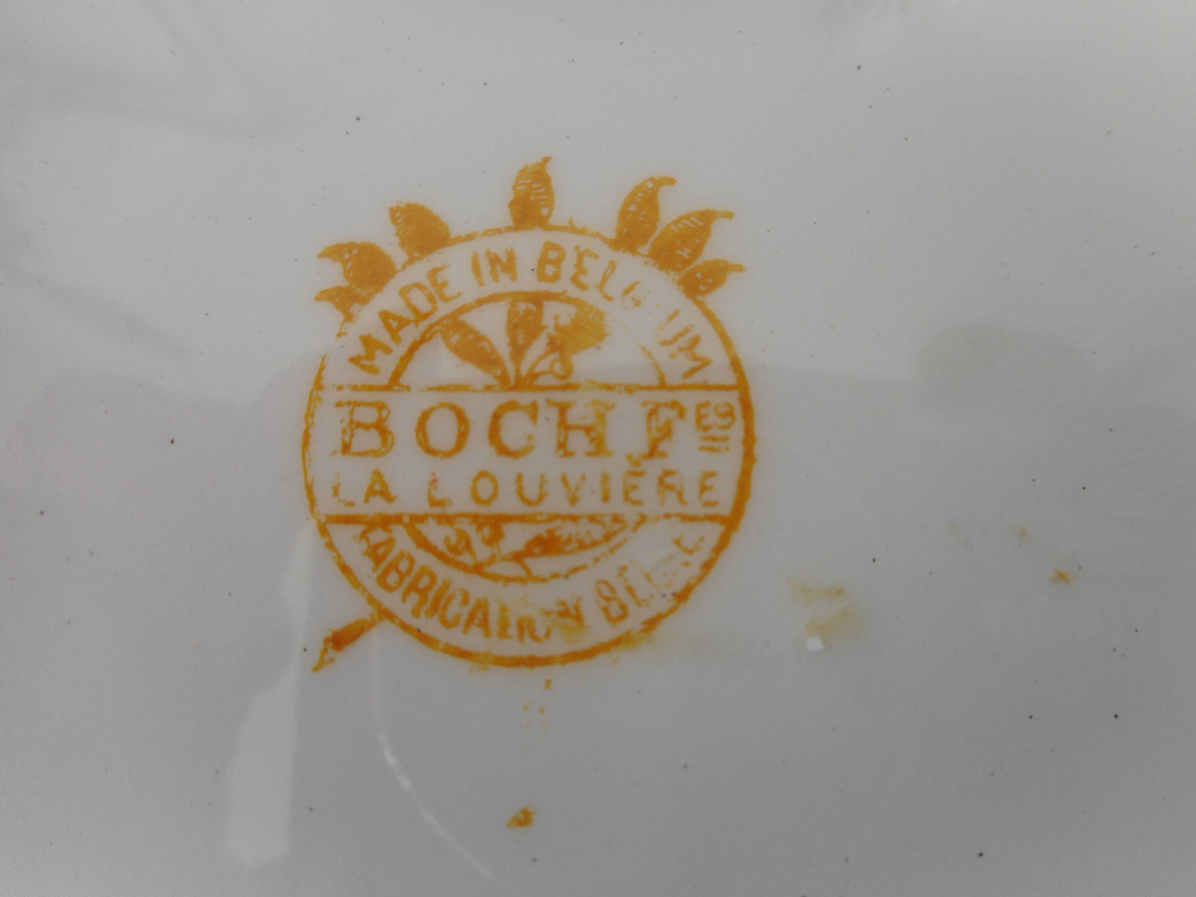 Set of 8 flat plates in Boch earthenware