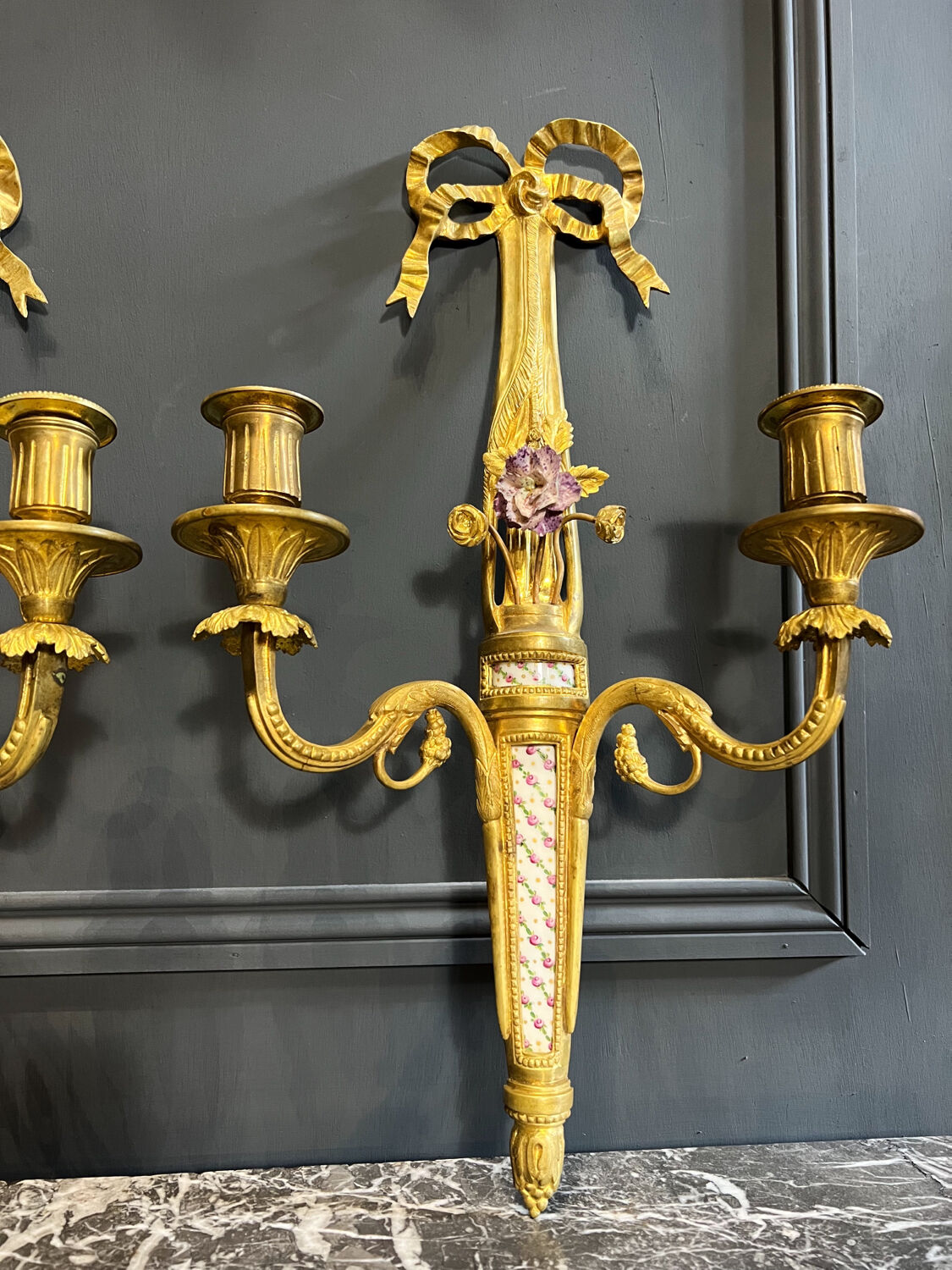 Pair of nineteenth century sconces in bronze and porcelain