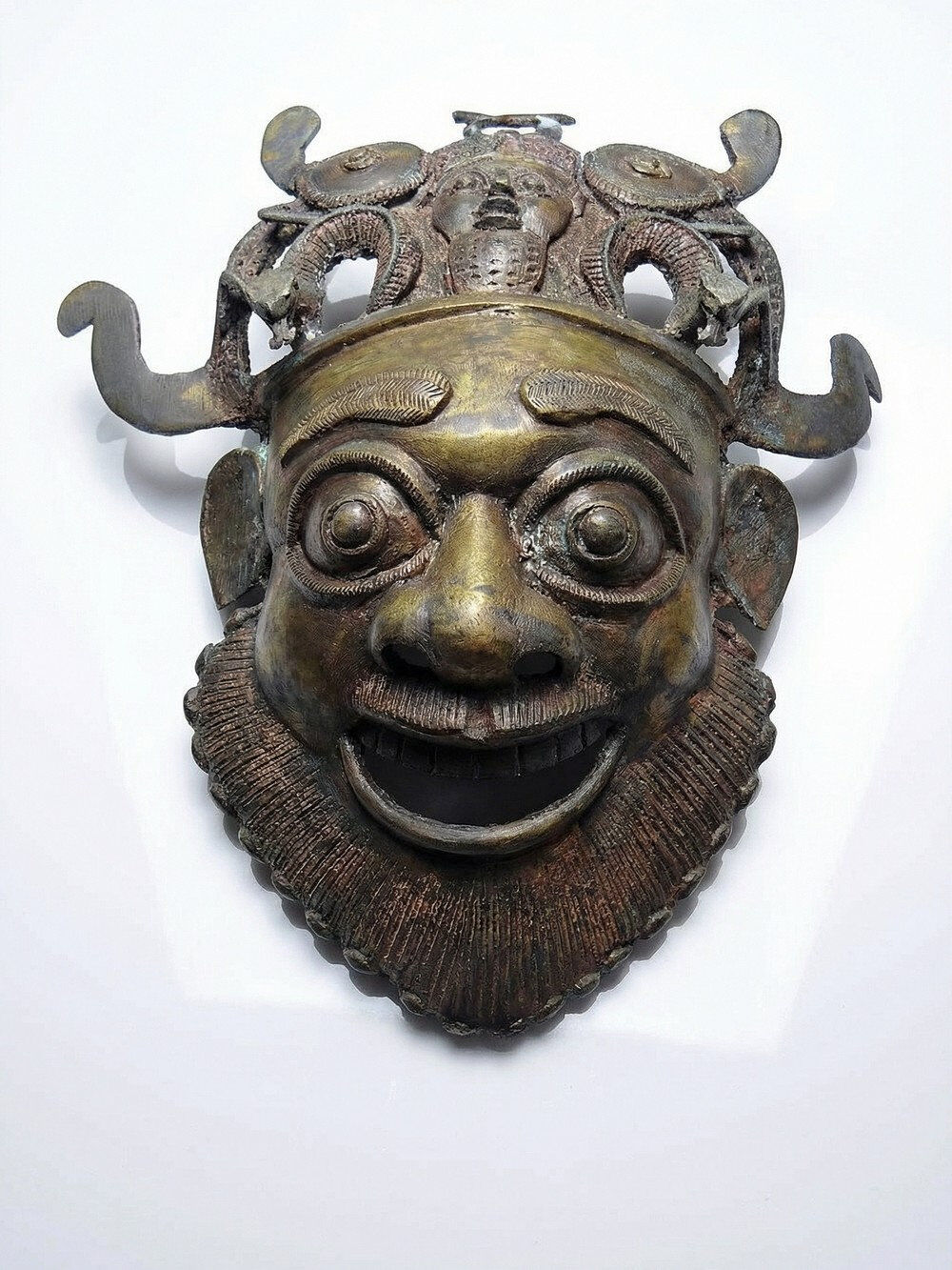 Vintage bronze African mask from Bamoun, Cameroon.