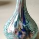 Ball vase soliflore with a long chimney neck. In speckled glass in the Murano style.