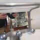Aluminum wall coat rack with pivoting mirror from the 60s