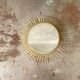 Vintage gold metal sun mirror