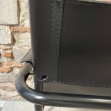 Armchair in black lacquered metal