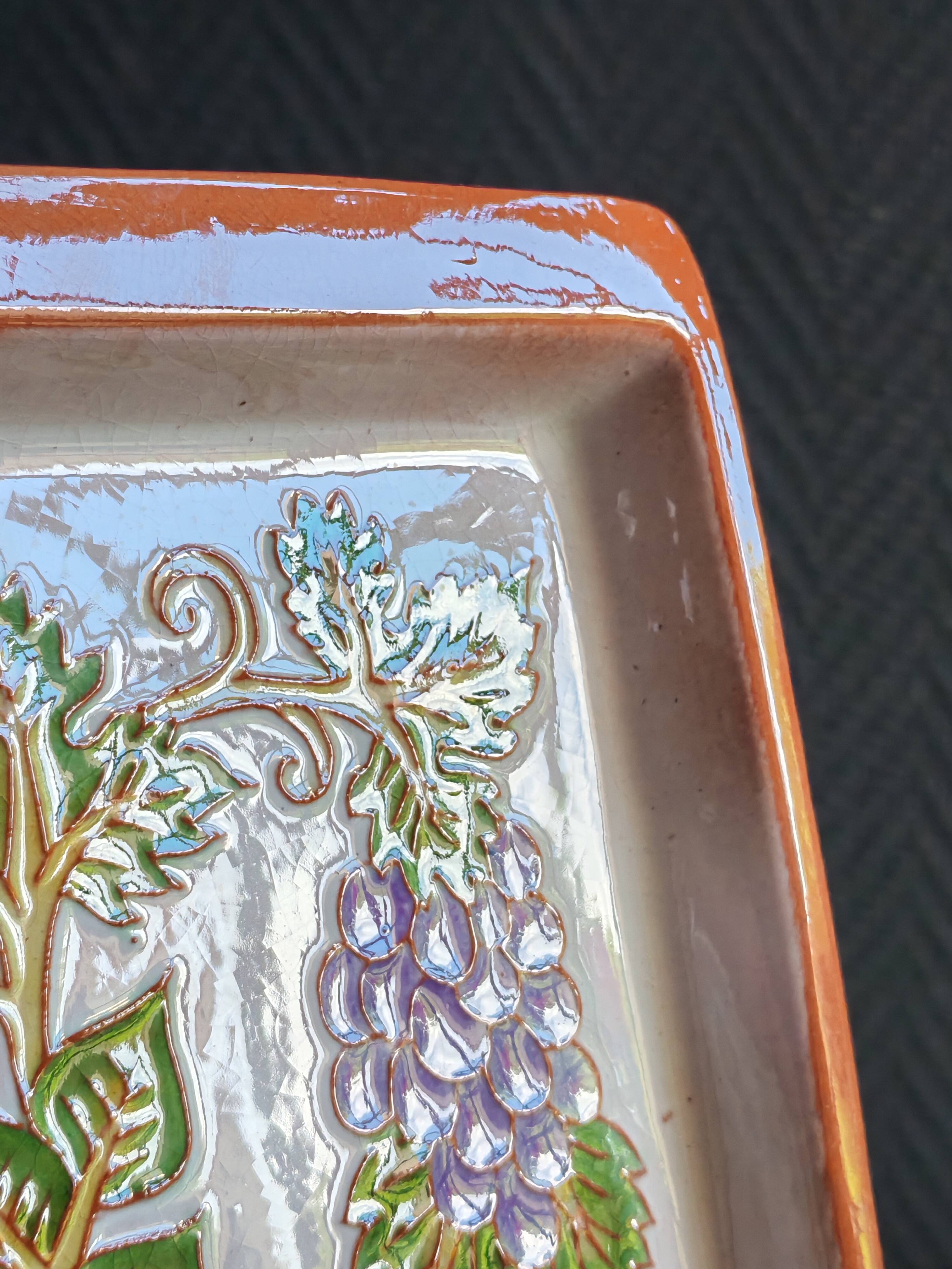 Terracotta plate signed P.Boy, glazed artisanal ceramics.