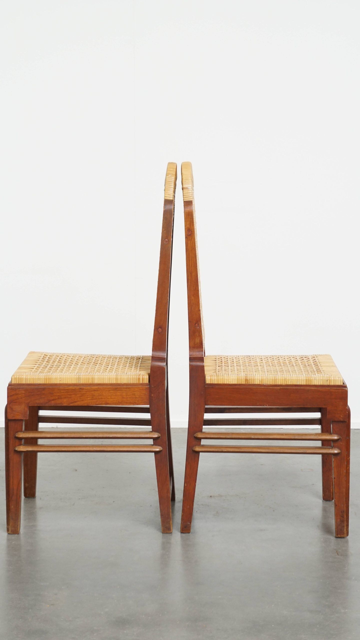 Set of two Art Deco design dining chairs with a wooden frame