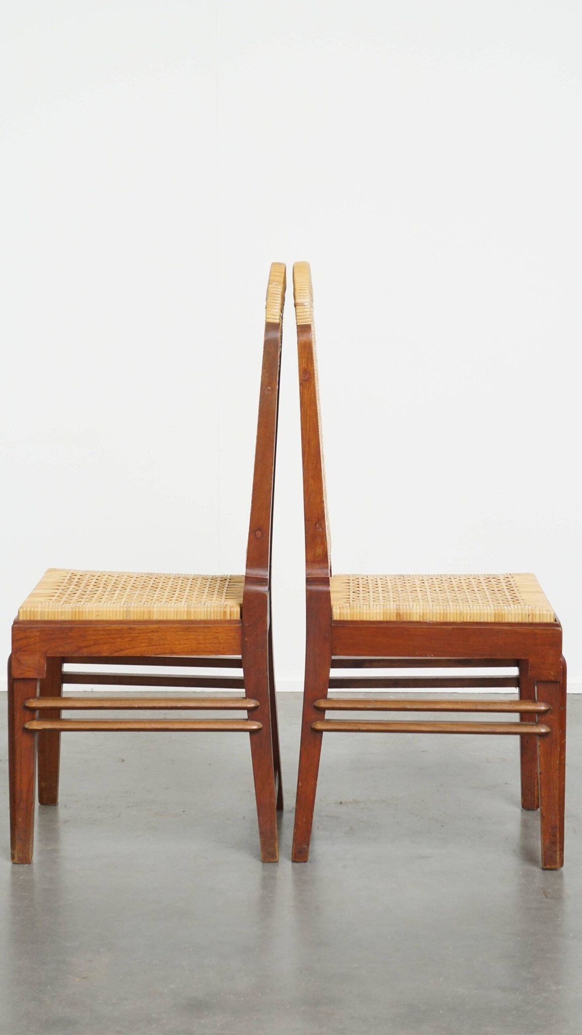 Set of two Art Deco design dining chairs with a wooden frame