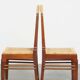 Set of two Art Deco design dining chairs with a wooden frame
