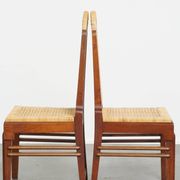 Set of two Art Deco design dining chairs with a wooden frame