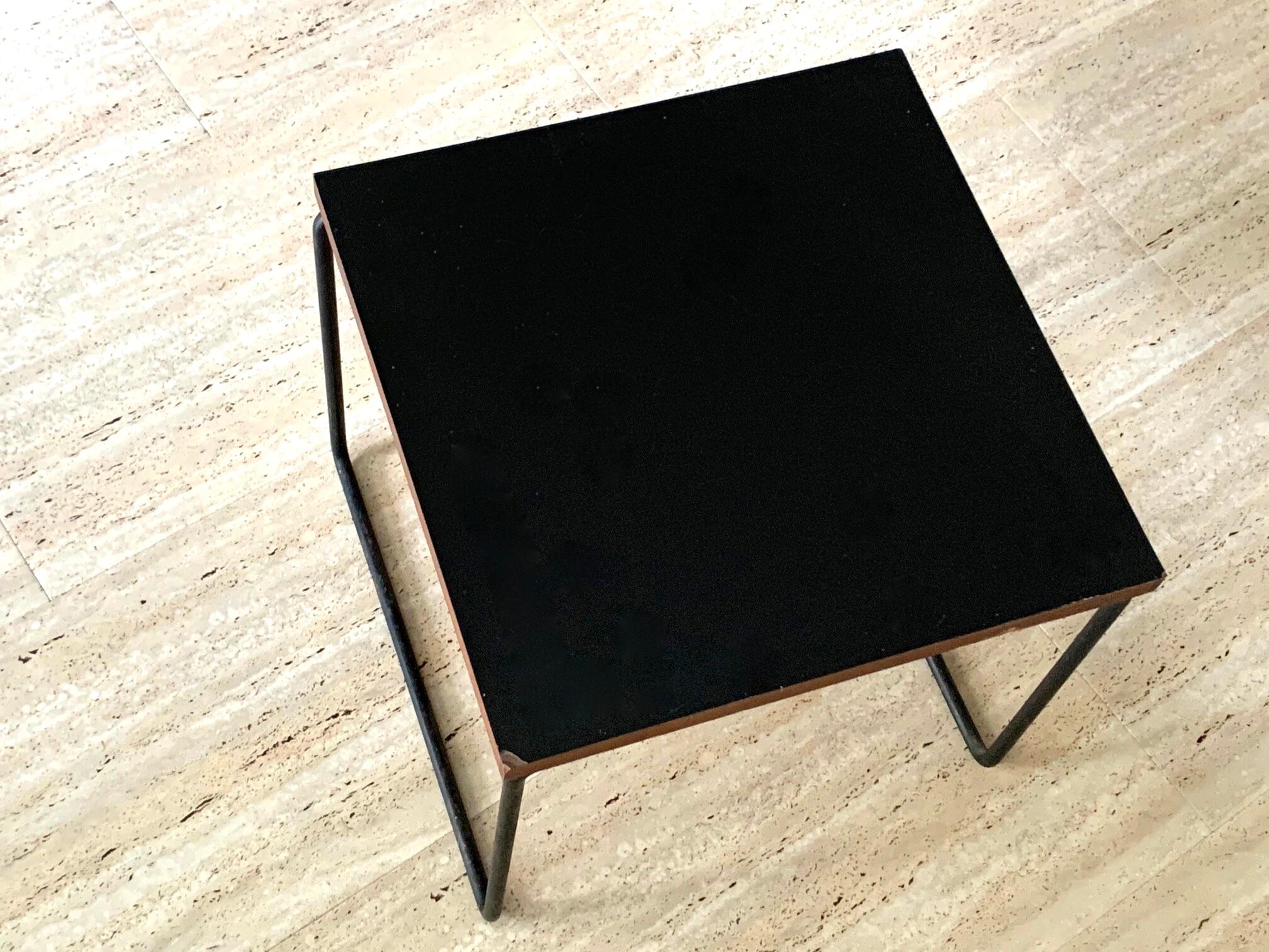 Black "flying" coffee table by Pierre Guariche for Steiner