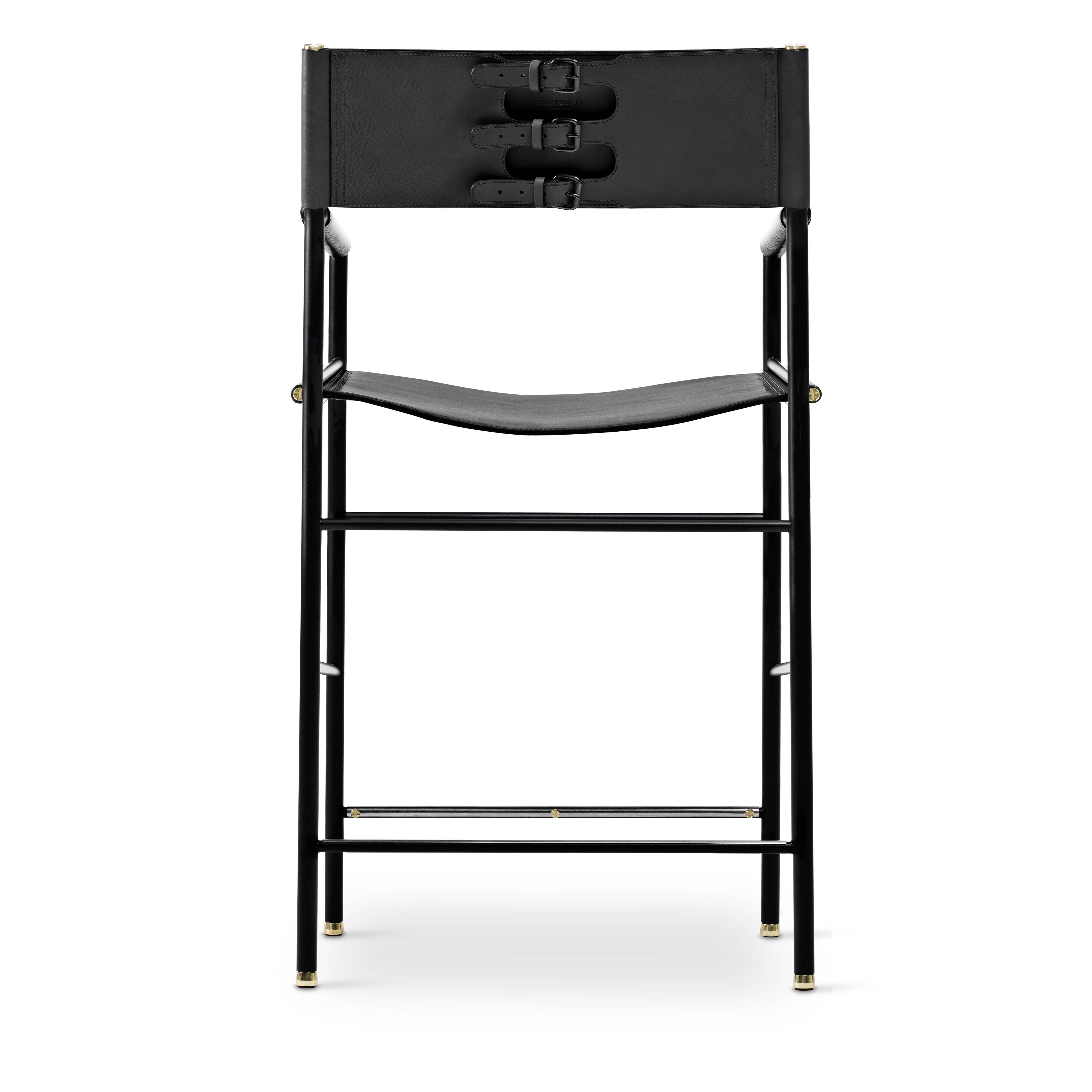 Set of 5 classic bar stools with black leather and rubber backing.