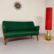 Old vintage green cocktail bean sofa from the 50s