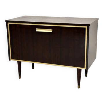Mid-century wooden and brass display cabinet with interior lighting.