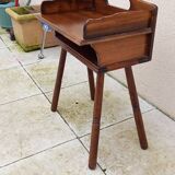 Vintage bedside table with compass legs