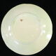 Plate in slurry with strawberry decoration and strawberry leaf