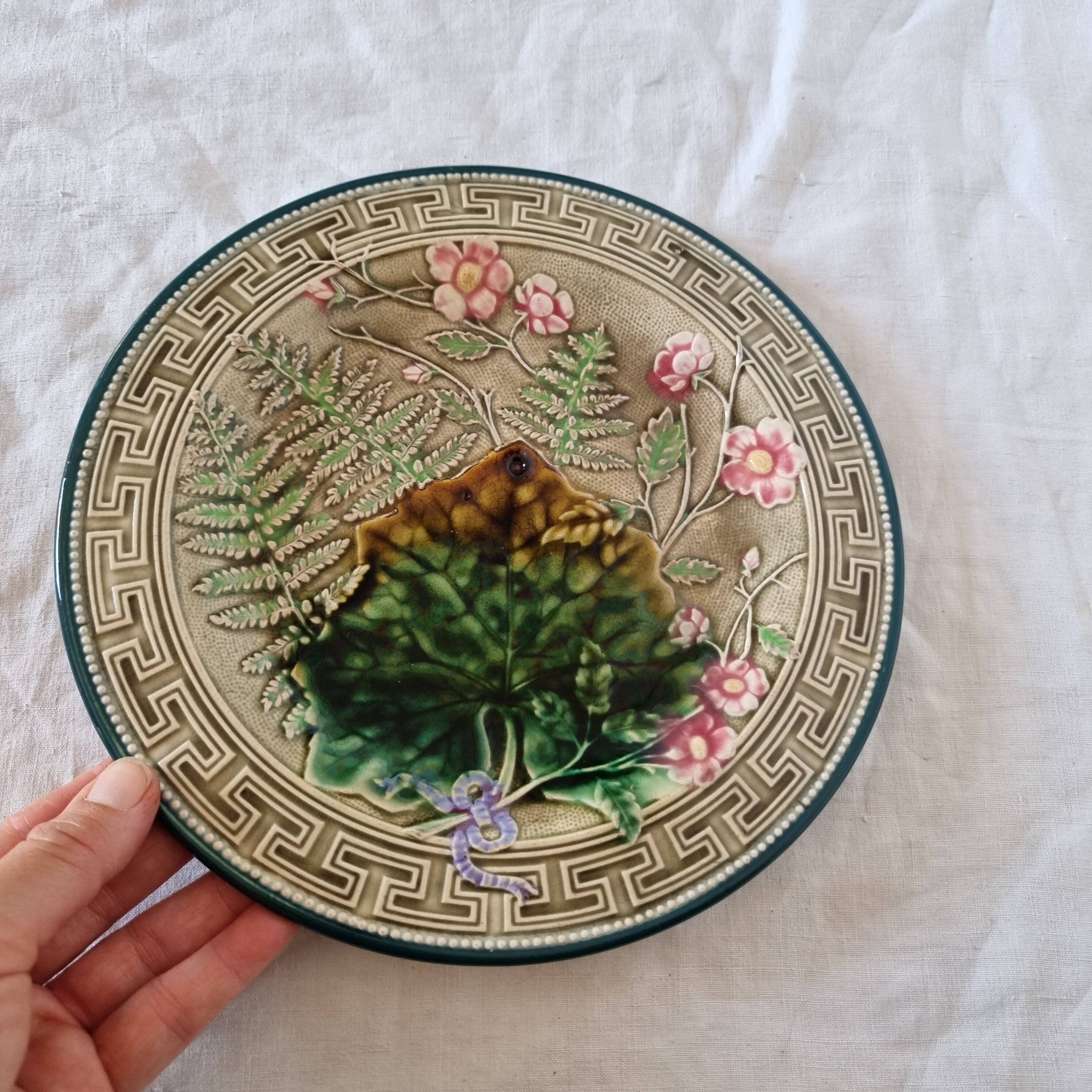 Choisy Le Roi majolica or barbotine dish decorated with leaves and pink flowers from the 19th century
