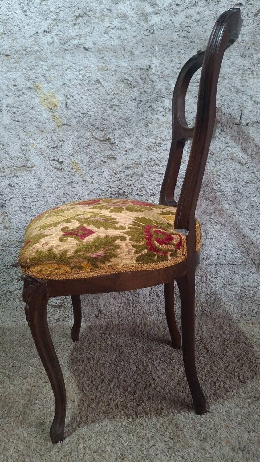 Carved walnut Napoleon III style velvet medallion chair