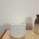 Vintage white flower pot with relief