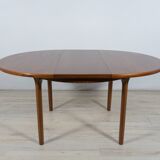 Round extendable dining table from McIntosh, 1960s