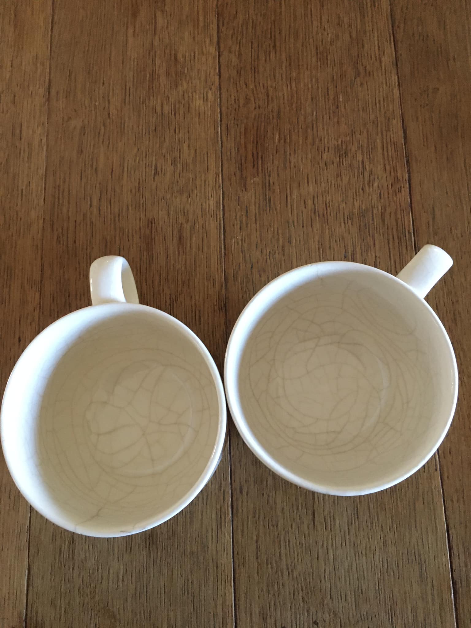 2 antique earthenware cups, red flower motifs