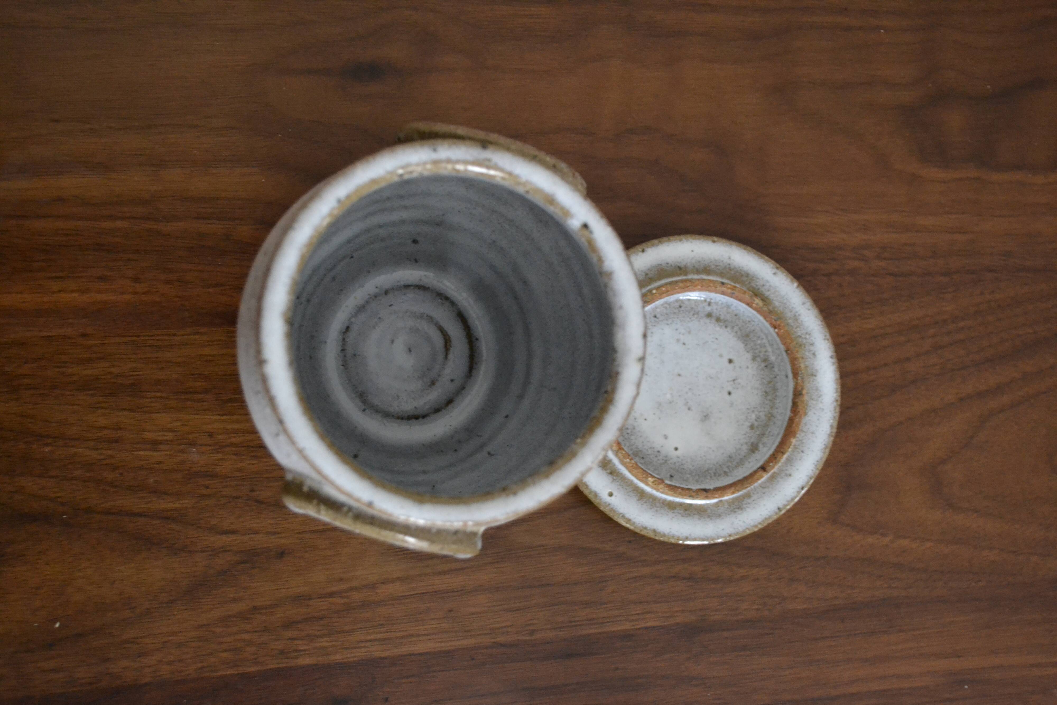 Artisanal beige sandstone pot