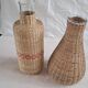 Pair of glass carafes / vases dressed in vintage woven rattan – A
