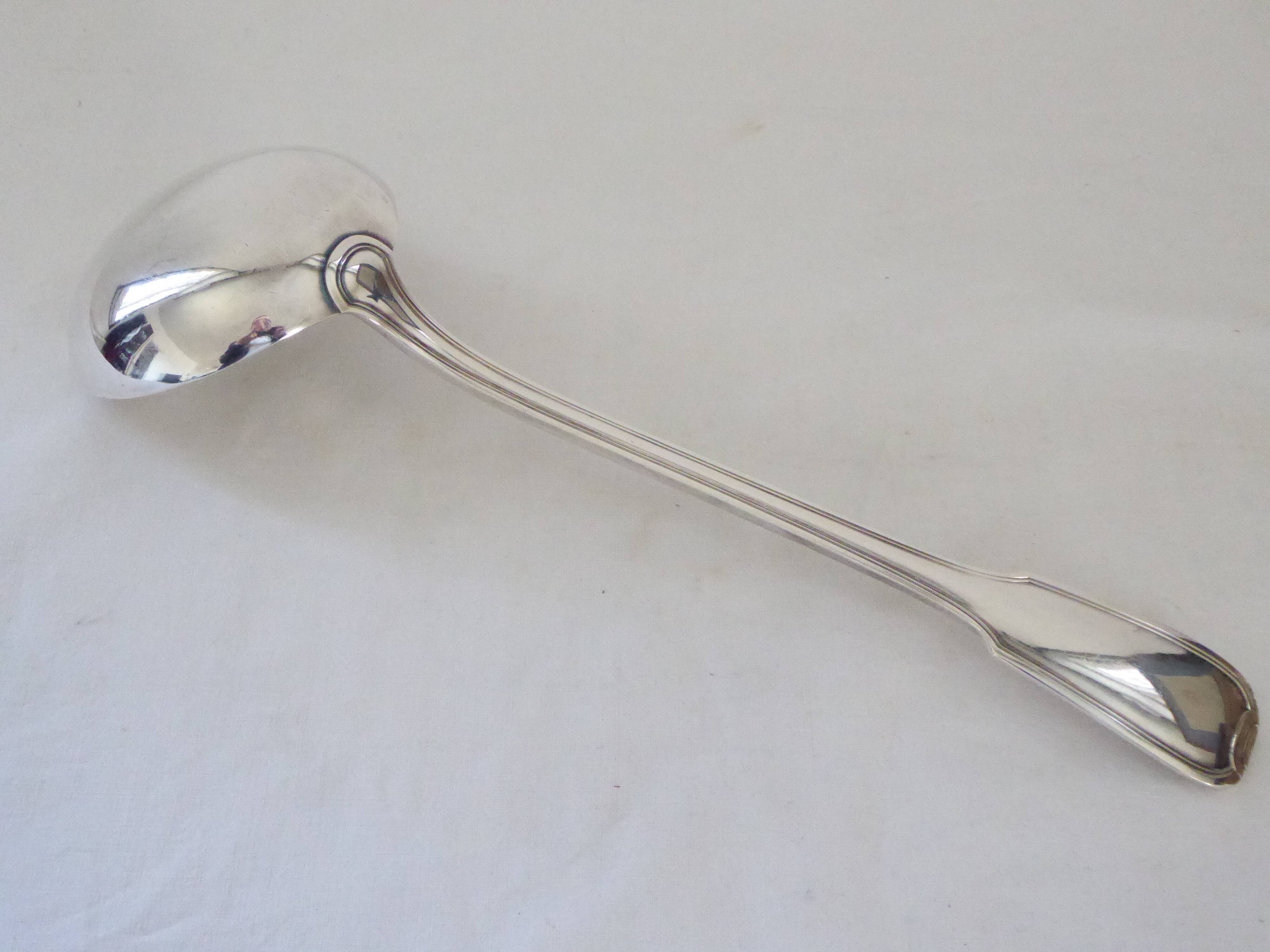 Silver metal ladle