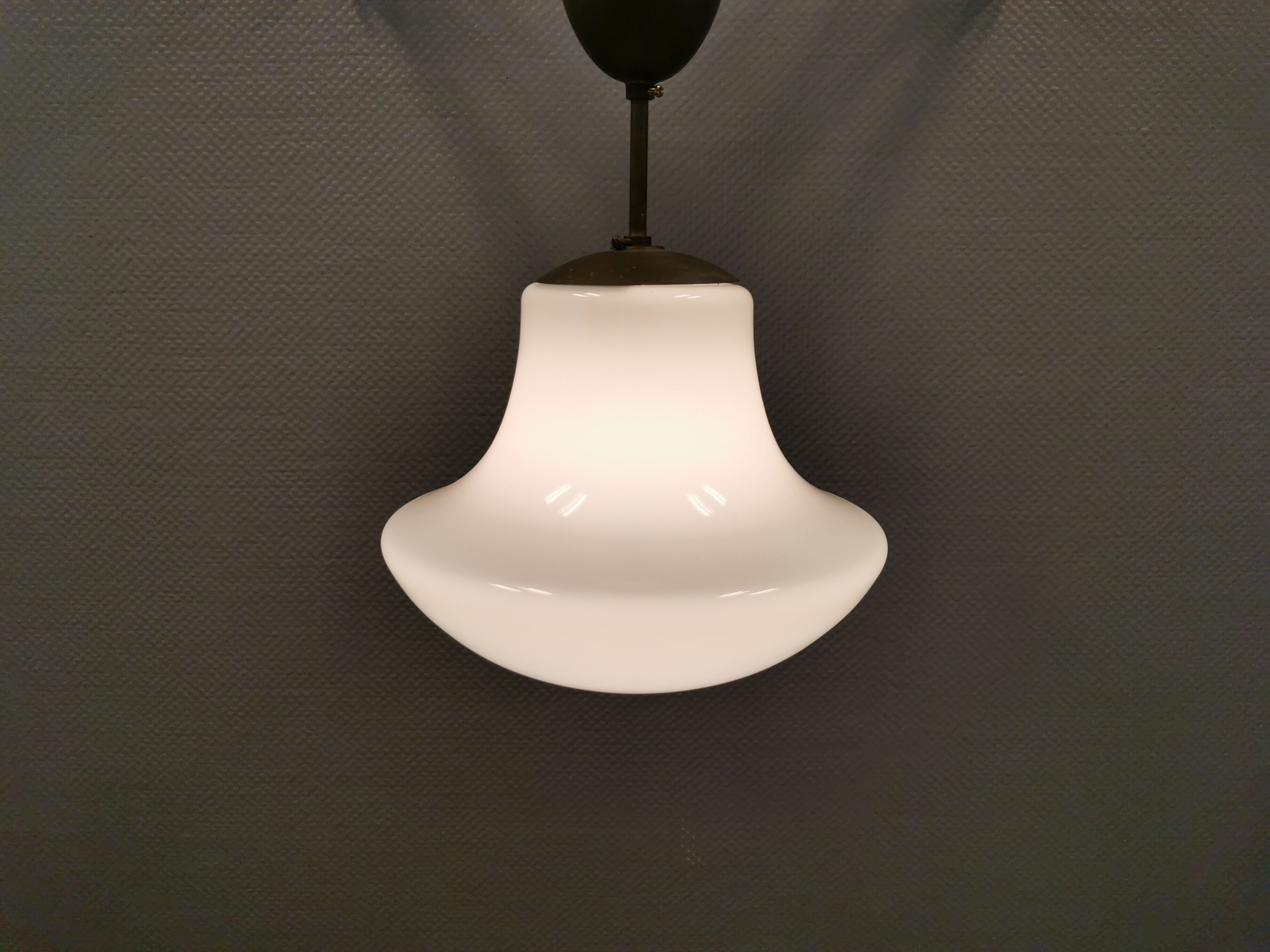 Older ceiling/hanging lamp in milky white opaline glass.