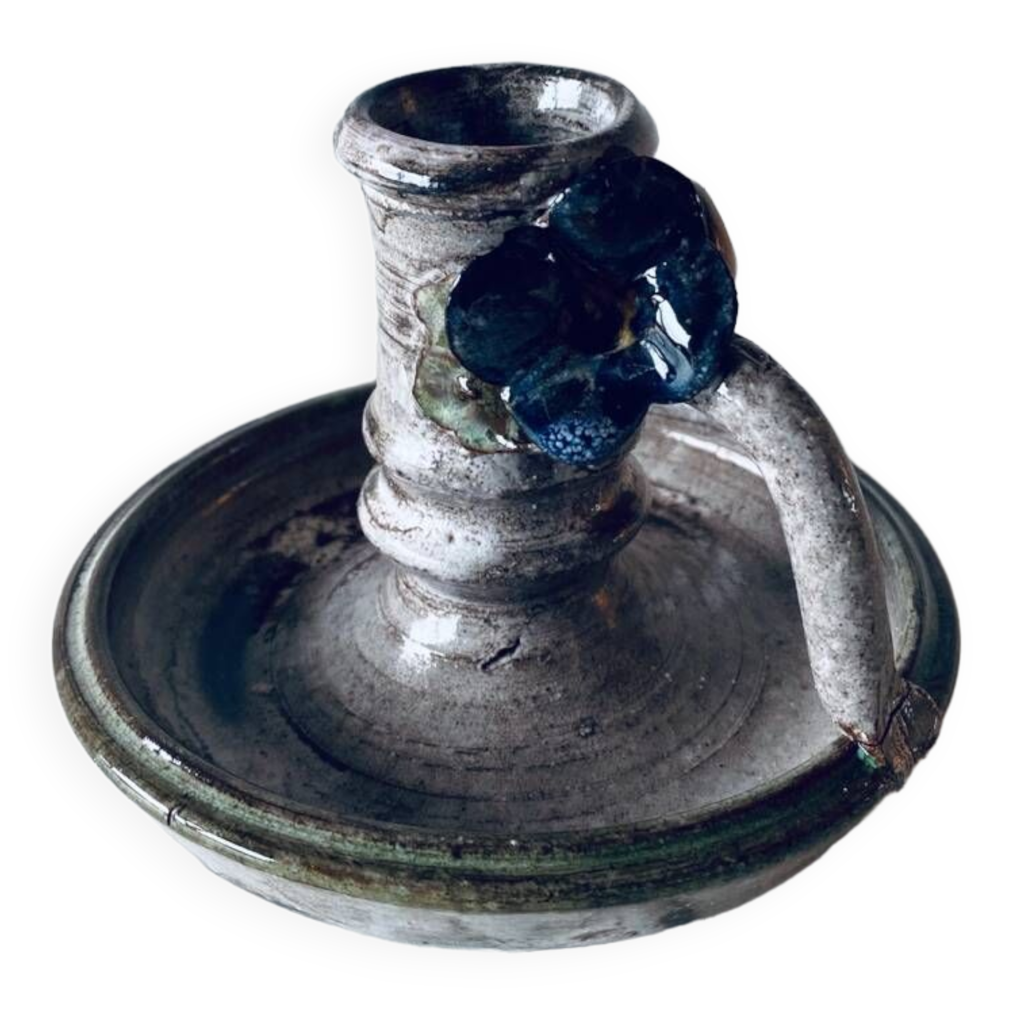 Ceramic candle holder with flower decor