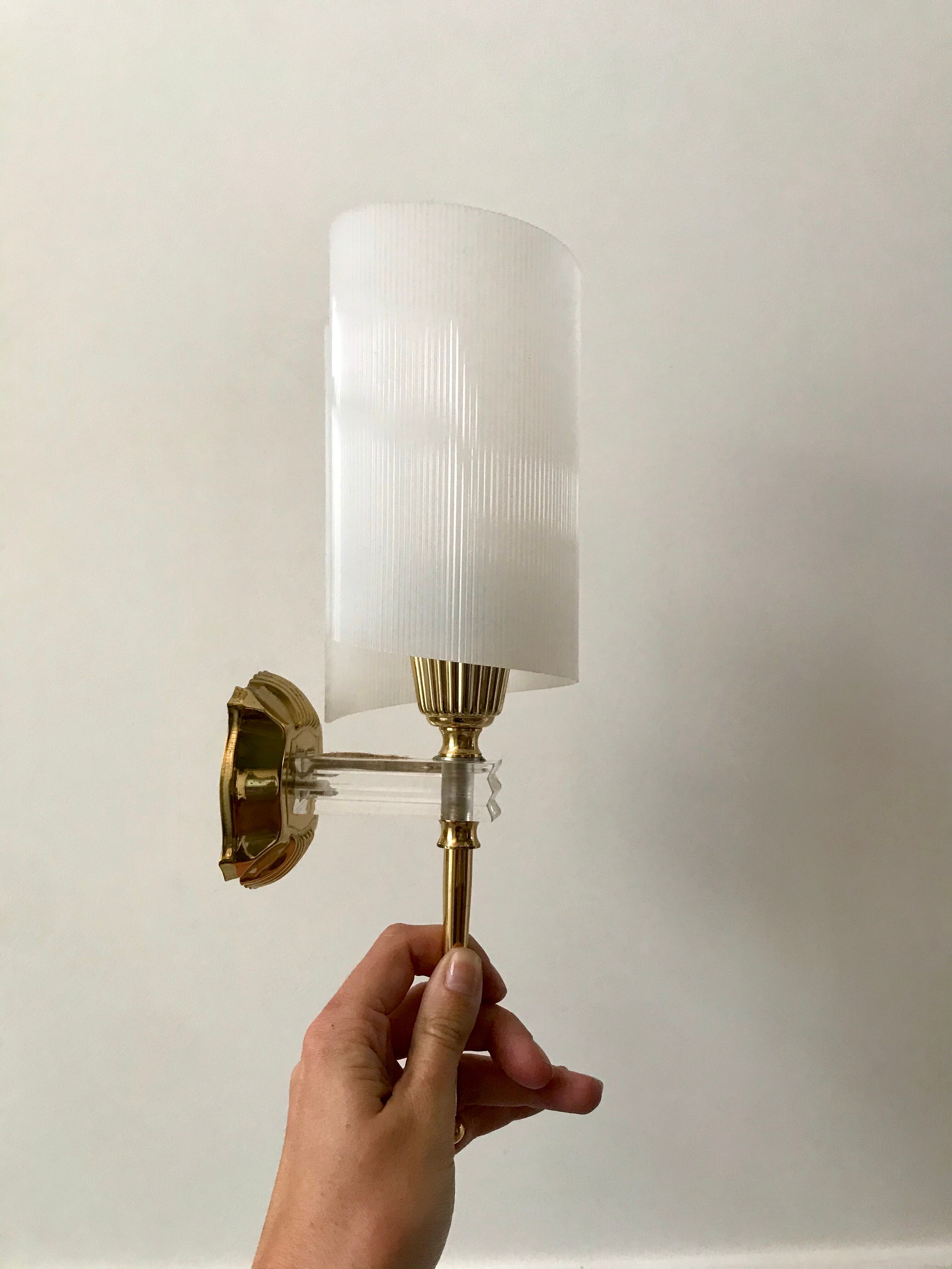 Pair of gold steel wall lamps, plexi and pleated plastic shades 60s-70s