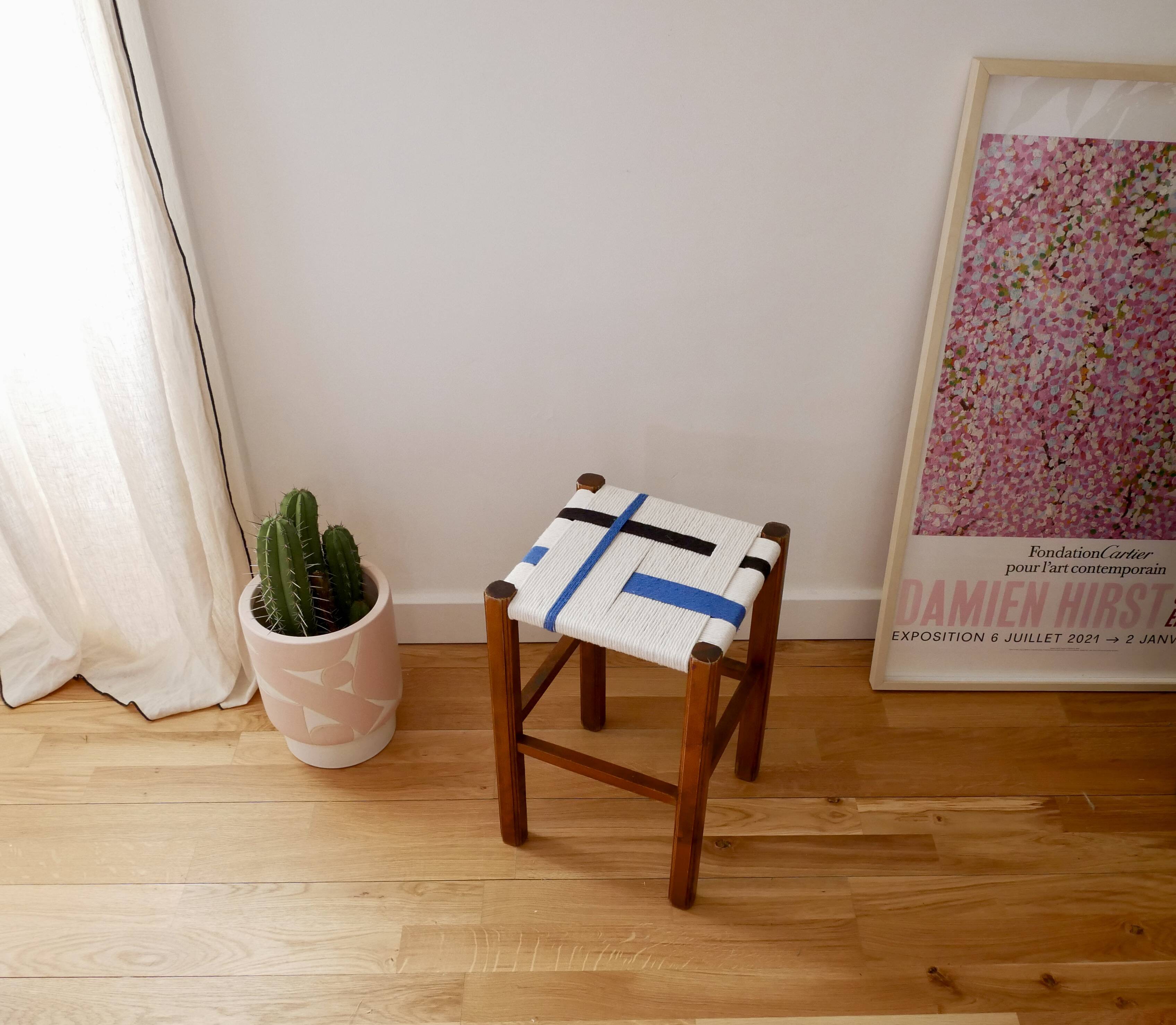Wooden stool. Vintage stool. woven stool