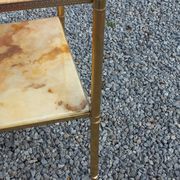 Pair of neoclassical side tables in bronze, brass, marble, and o.