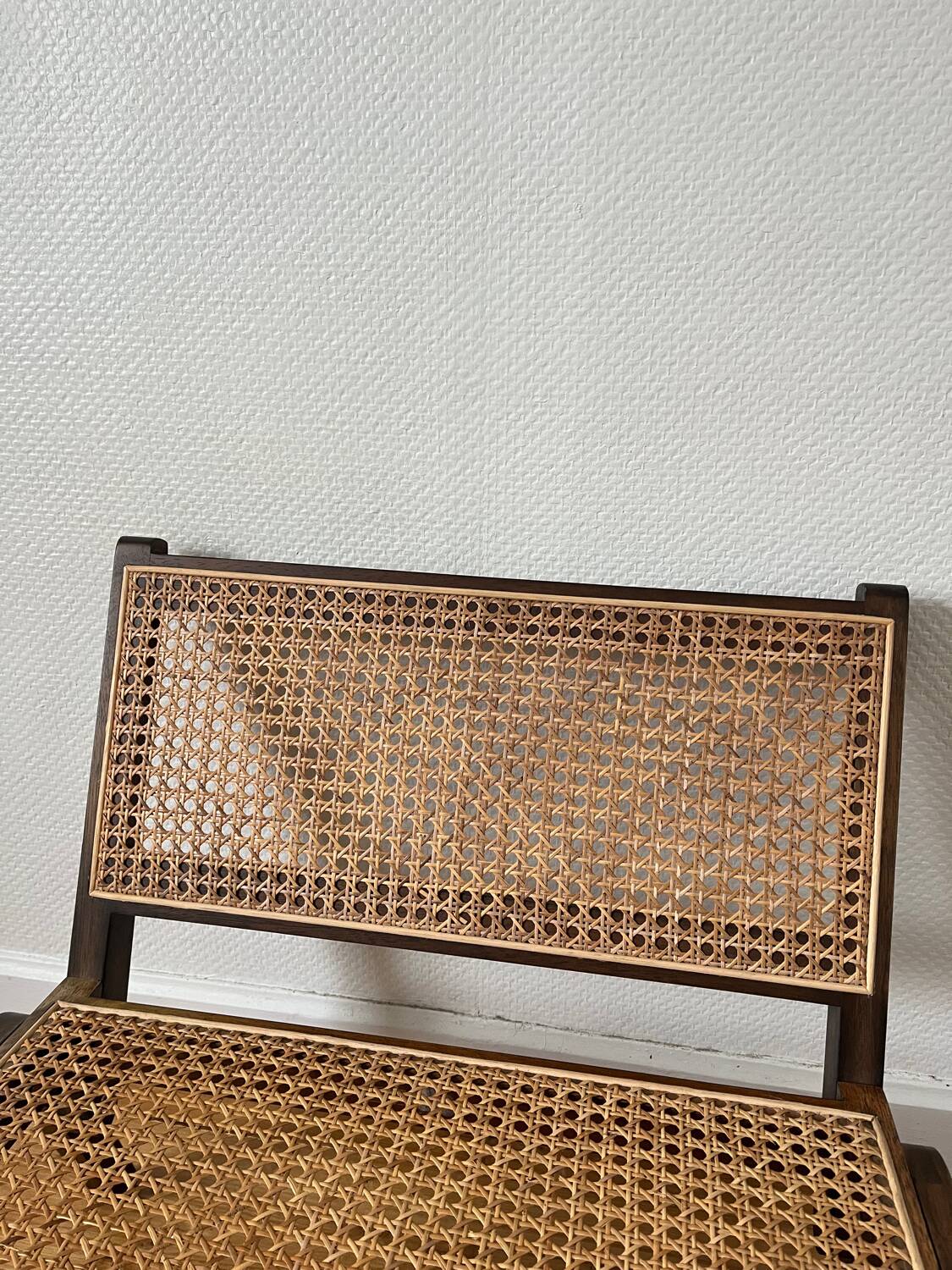 Vintage wooden and cane armchair