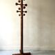 Modernist coat rack on a stand and rotating in solid pine, The Arcs 1970.