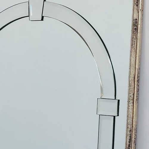 Large Art Deco style beveled wall mirror with architectural arch design