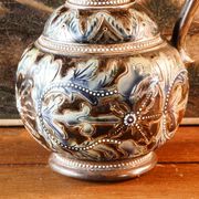 Doulton Lambeth stoneware jug (1879), floral decoration by Henry Winstanley.