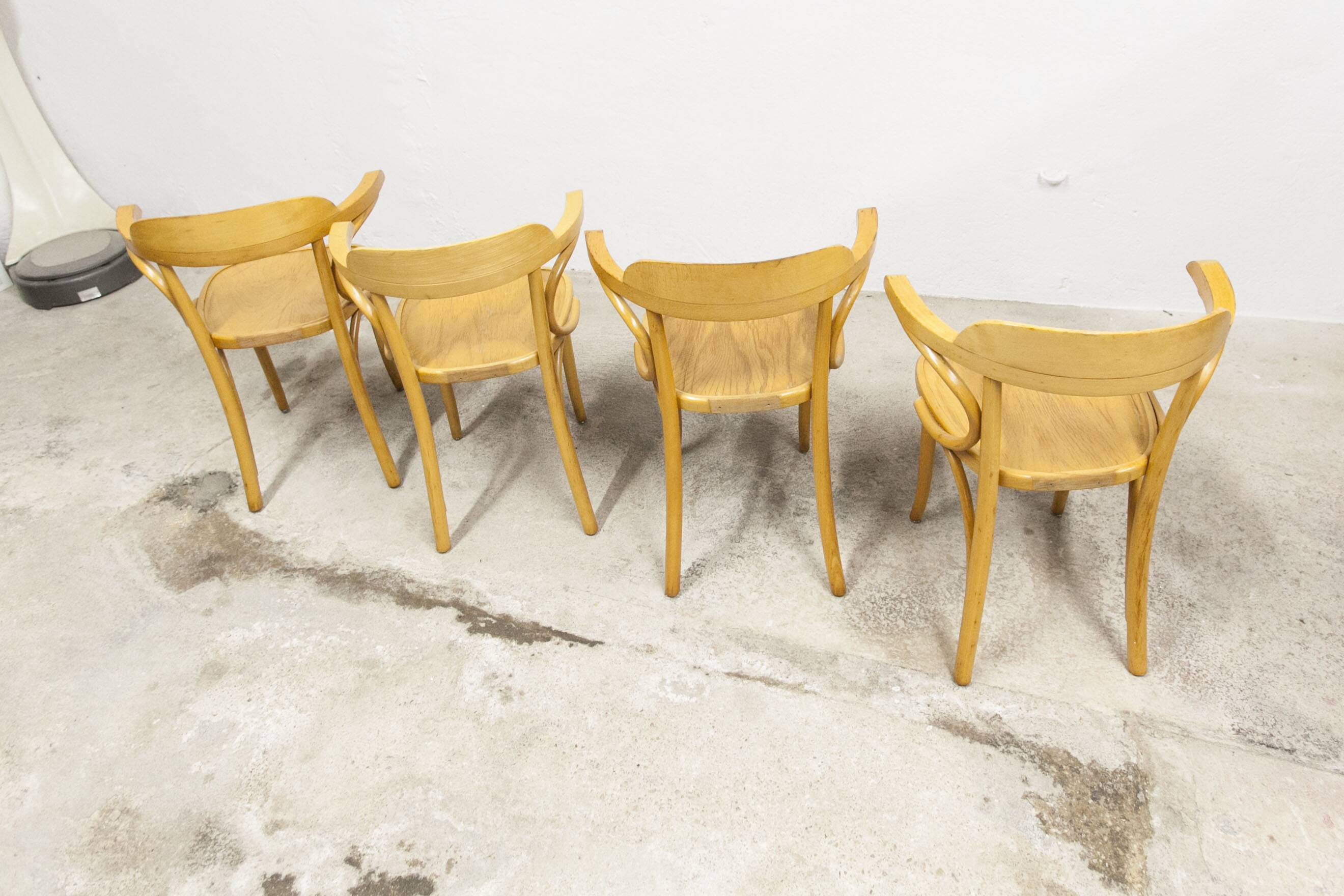 Set of 4 bistro armchairs with armrests from the 1960s.