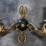 Antique bronze wall light with arm decorated with swans and palmettes in the Empire style