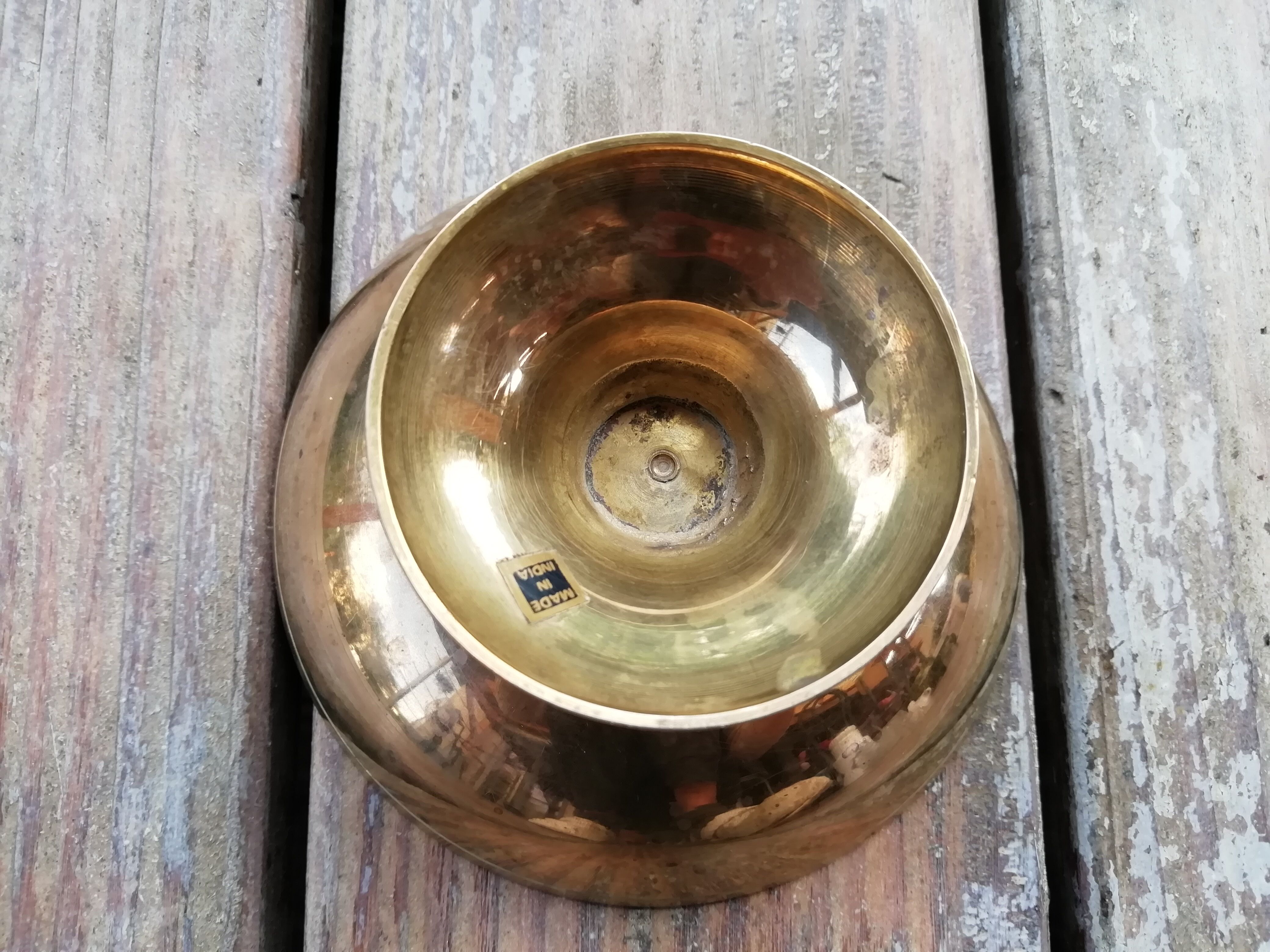 Partitioned brass cup