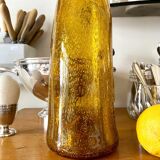 Biot "Narrow Bottle 45" in golden yellow bubbled glass