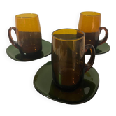 3 amber cups and green saucer