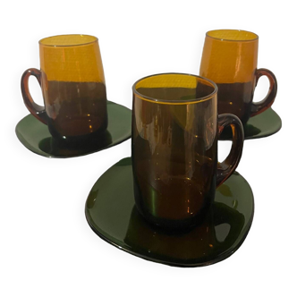 3 amber cups and green saucer