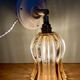 Vintage tulip wall light in thick amber glass