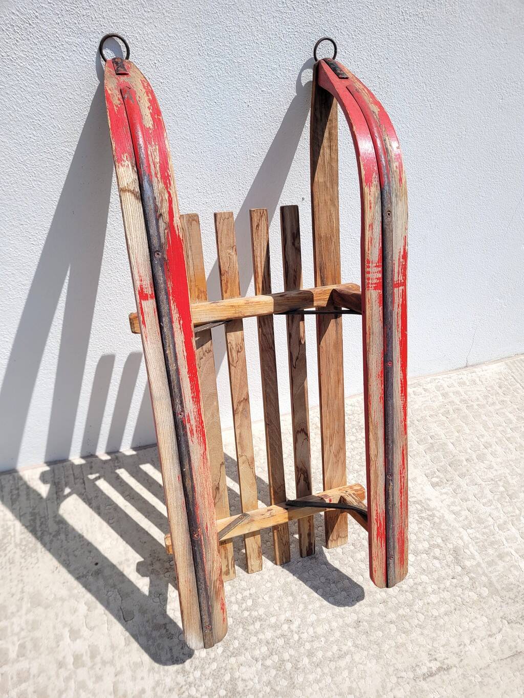 Antique wooden sled with metal runners