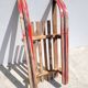 Antique wooden sled with metal runners