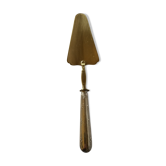 Old pie shovel in box