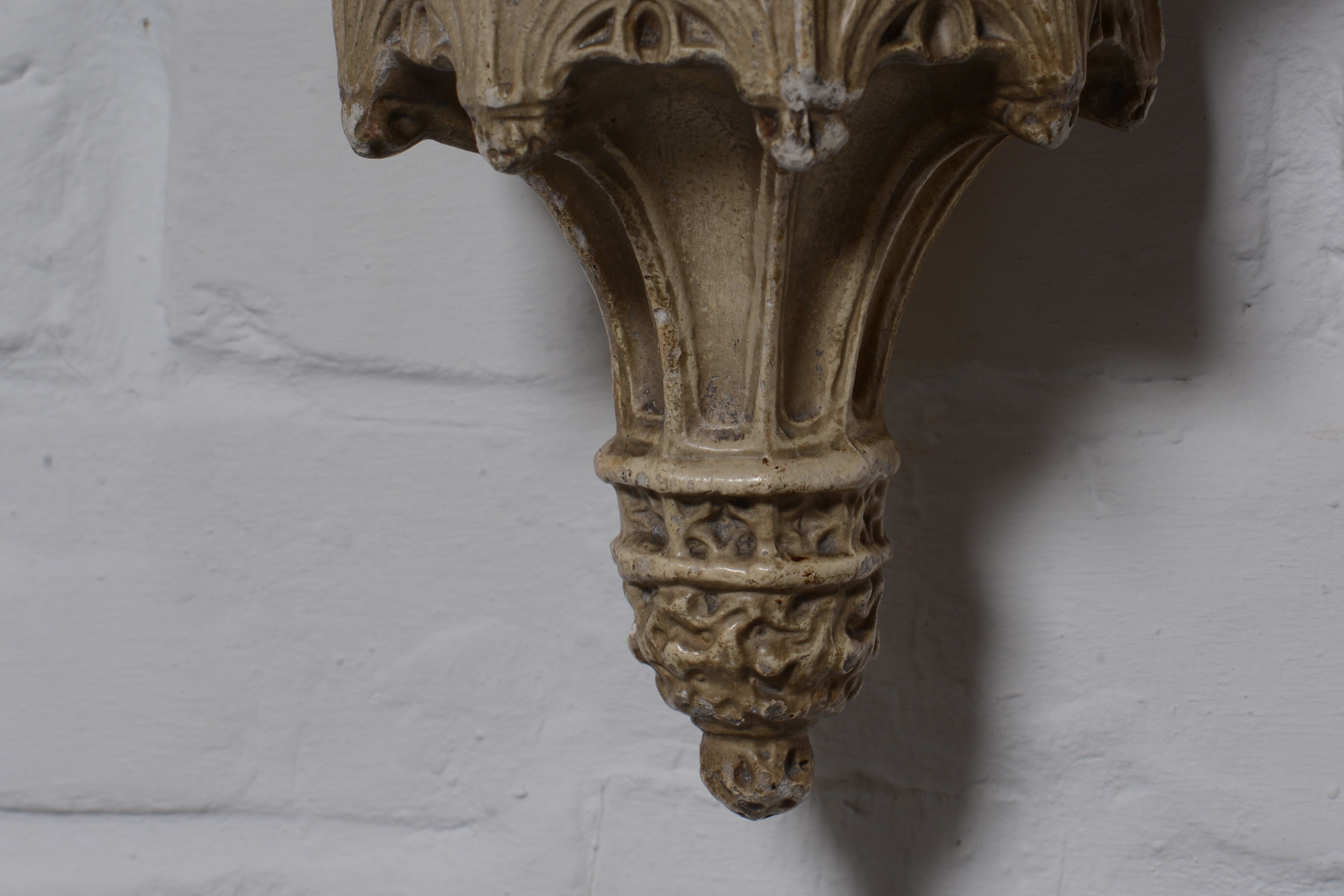 Gothic-style plaster wall console